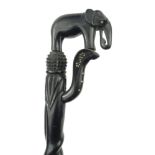 Carved ebony and ivory elephant walking stick, 89cm long :For Condition Reports please visit www.