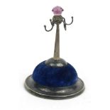 Novelty silver ring stand/pincushion, hallmarked R.P Birmingham 1910-11, 8.5cm high :For Condition