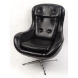 Vintage 1970s black leatherette buttonback swivel chair, retailed by Shetland & Hedger, 99cm