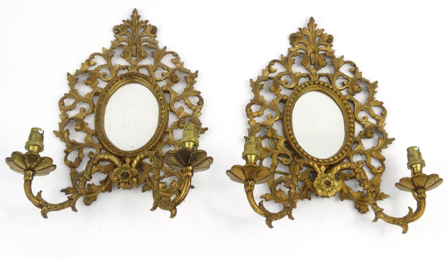 Pair of Victorian gilt brass girondelle mirrors with floral scrolls  each 35cm high :For Condition