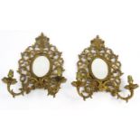 Pair of Victorian gilt brass girondelle mirrors with floral scrolls  each 35cm high :For Condition