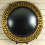 Victorian circular convex gilt wood mirror, 64cm diameter :For Condition Reports please visit www.