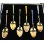 Cased set of six silver gilt enamelled teaspoons housed in a W. Bruford & Son Eastbourne box, the