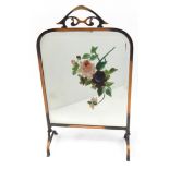 Art Nouveau mirrored firescreen with painted floral decoration, 71cm high : For Condition Reports