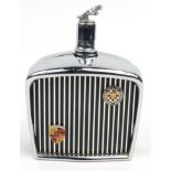 Motoring interest decanter in the form of a Jaguar car radiator with enamel Grand Prix and