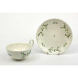 Swansea porcelain cup and saucer hand painted with flowers, the saucer 17cm diameter The cup has a