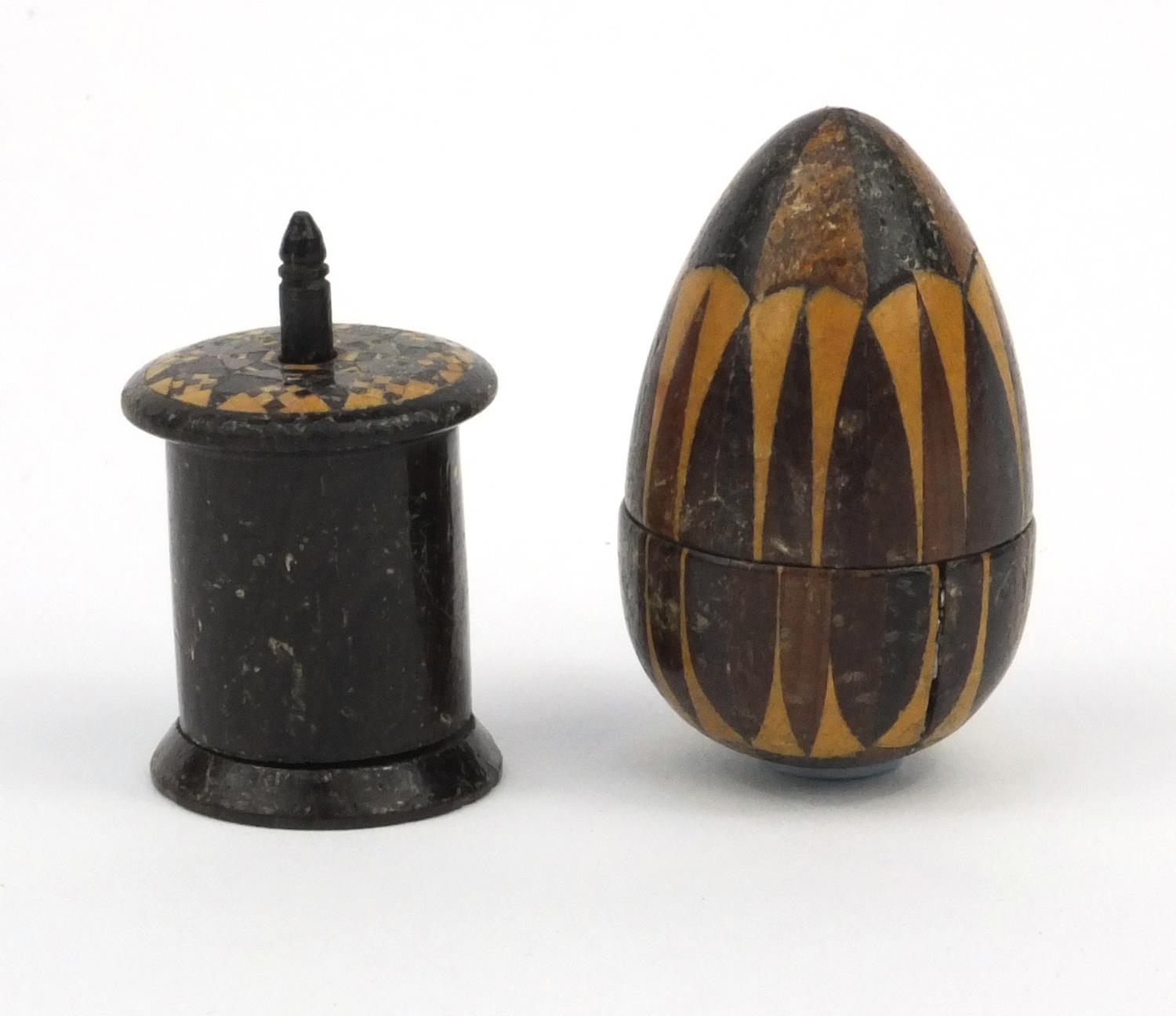 Victorian wooden Tunbridge ware egg-shaped thimble holder, together with a tape measure, the largest