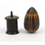 Victorian wooden Tunbridge ware egg-shaped thimble holder, together with a tape measure, the largest