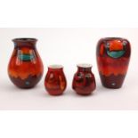 Four Poole pottery Delphis patterned vases, the largest 17cm high All in generally good condition,