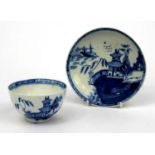 Lowestoft porcelain tea bowl and saucer hand painted with an oriental landscape, the saucer 12.5cm