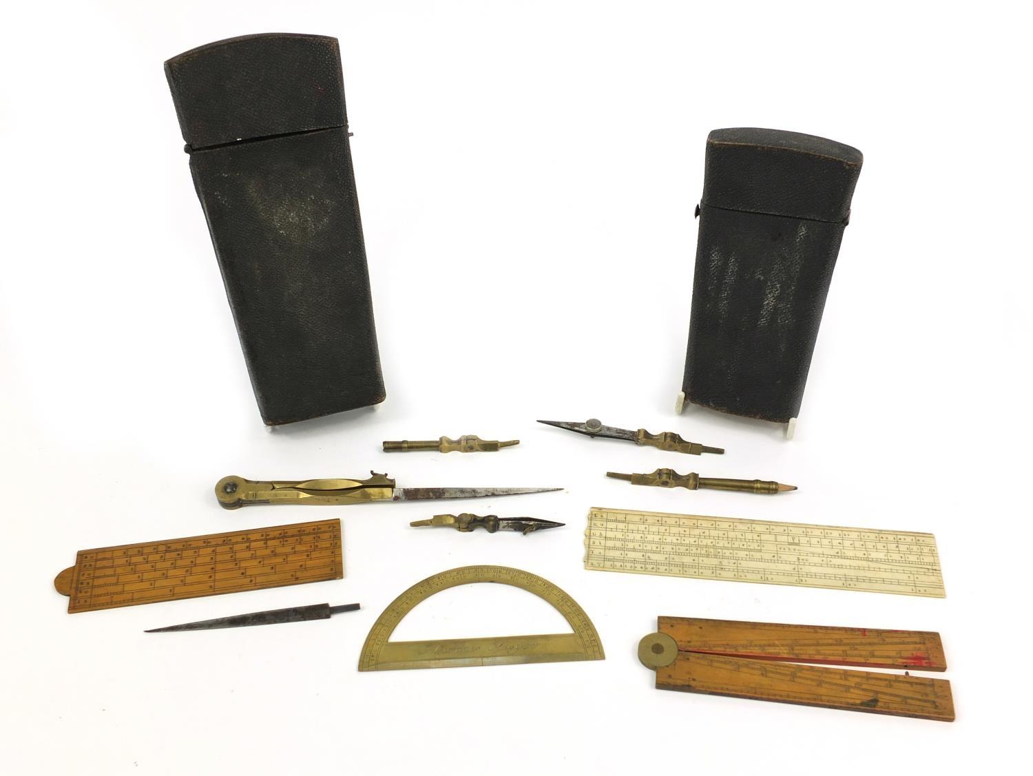 Two shagreen drawing instrument cases - one with rulers and compasses, the larger 17.5cm long