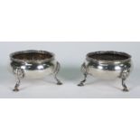 Pair of Georgian silver three footed salts, indistinct hallmarks, 6.5cm diameter