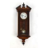 Mahogany Vienna regulator wall clock, with enamel dial and turned finials, 85cm high