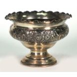 Silver pedestal bowl with embossed floral decoration, W.D Birmingham 1906, 9.5cm high