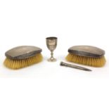 Group of silver items comprising pair of silver backed brushes, silver eggcup and an Eversharp