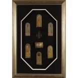 Military interest mounted and cased World War I German badges and insignia including Iron Cross,