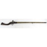 Middle Eastern flintlock rifle with brass mounted barrel, 150cm long