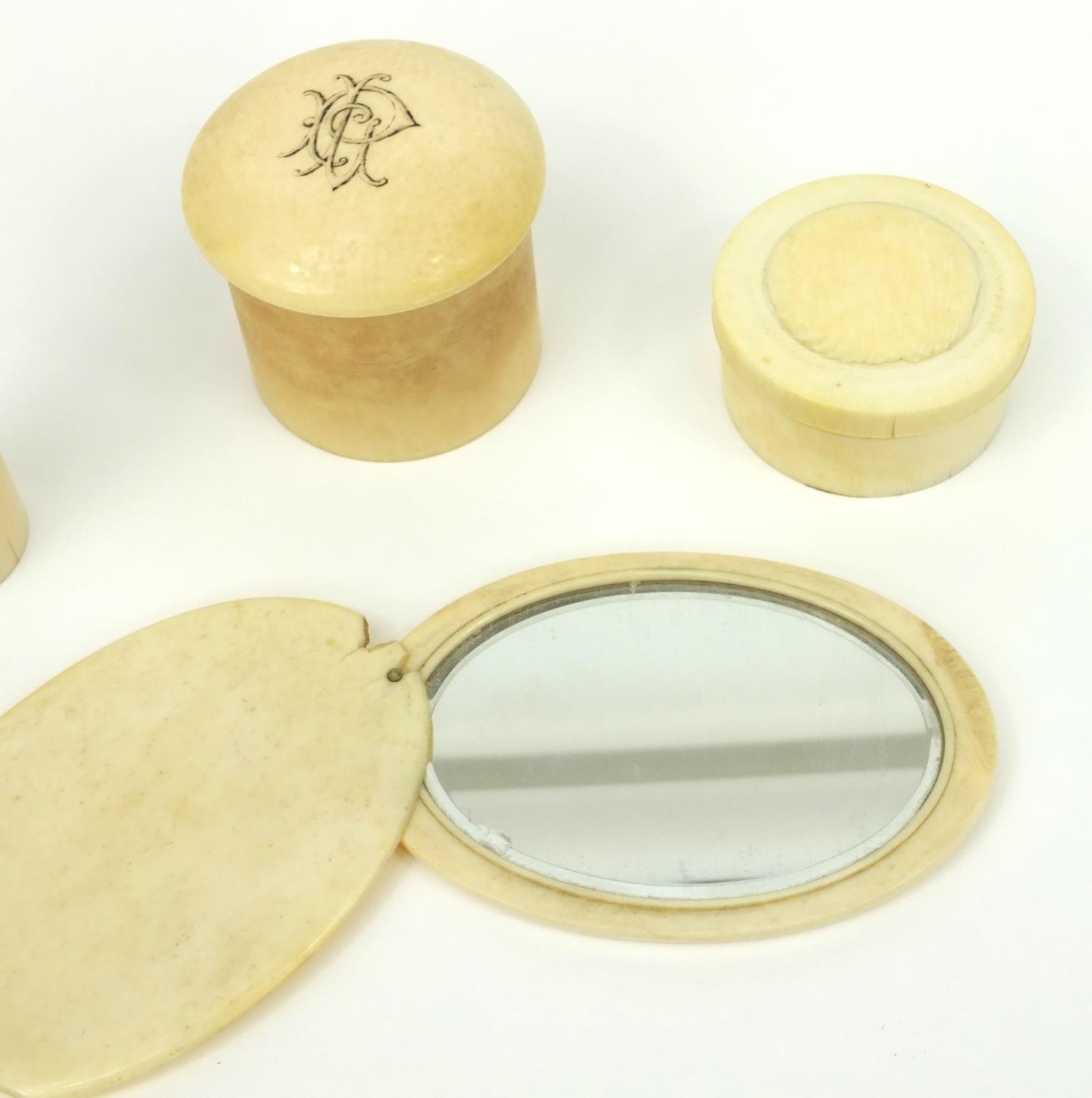 Three ivory screw top containers, together with an ivory hand mirror, the hand mirror 11cm long when - Image 2 of 5