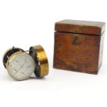 Brass air meter with silvered dial in original wooden carrying box, number 864, 9cm high