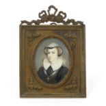 Miniature watercolour portrait of a Continental lady, mounted in an Edwardian brass bow design