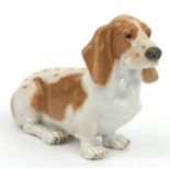 Royal Copenhagen model of a Bassett hound, 14cm high Generally good condition, no chips or cracks