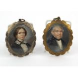 Two Georgian hand painted portrait miniatures of a lady and gentleman, housed in unmarked silver