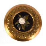 Victorian pietra dura floral marble plaque mounted in a brass surround, 15cm diameter