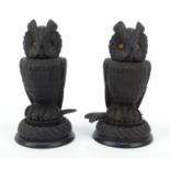 Pair of Victorian bog oak owl pots and covers with beaded glass eyes, each 17cm high