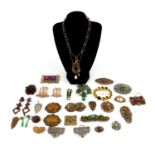 Assorted vintage costume jewellery brooches, some set with colourful stones, enamelled examples,