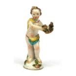 Chelsea hand painted porcelain figure of a putti, circa 1755, red anchor mark to base, 10.5cm high