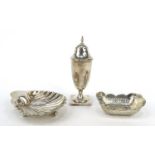 Silver sifter, shell shaped dish and bonbon dish with pierced decoration, various hallmarks, the