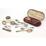 Group of silver and white metal items including pill box, page turner, cased christening set, etc