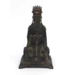 Oriental Chinese gilt bronze seated emperor Kangxi, character marks to back, 26cm high Generally