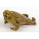Novelty interest painted leather toad with ugly face, 20cm diameter