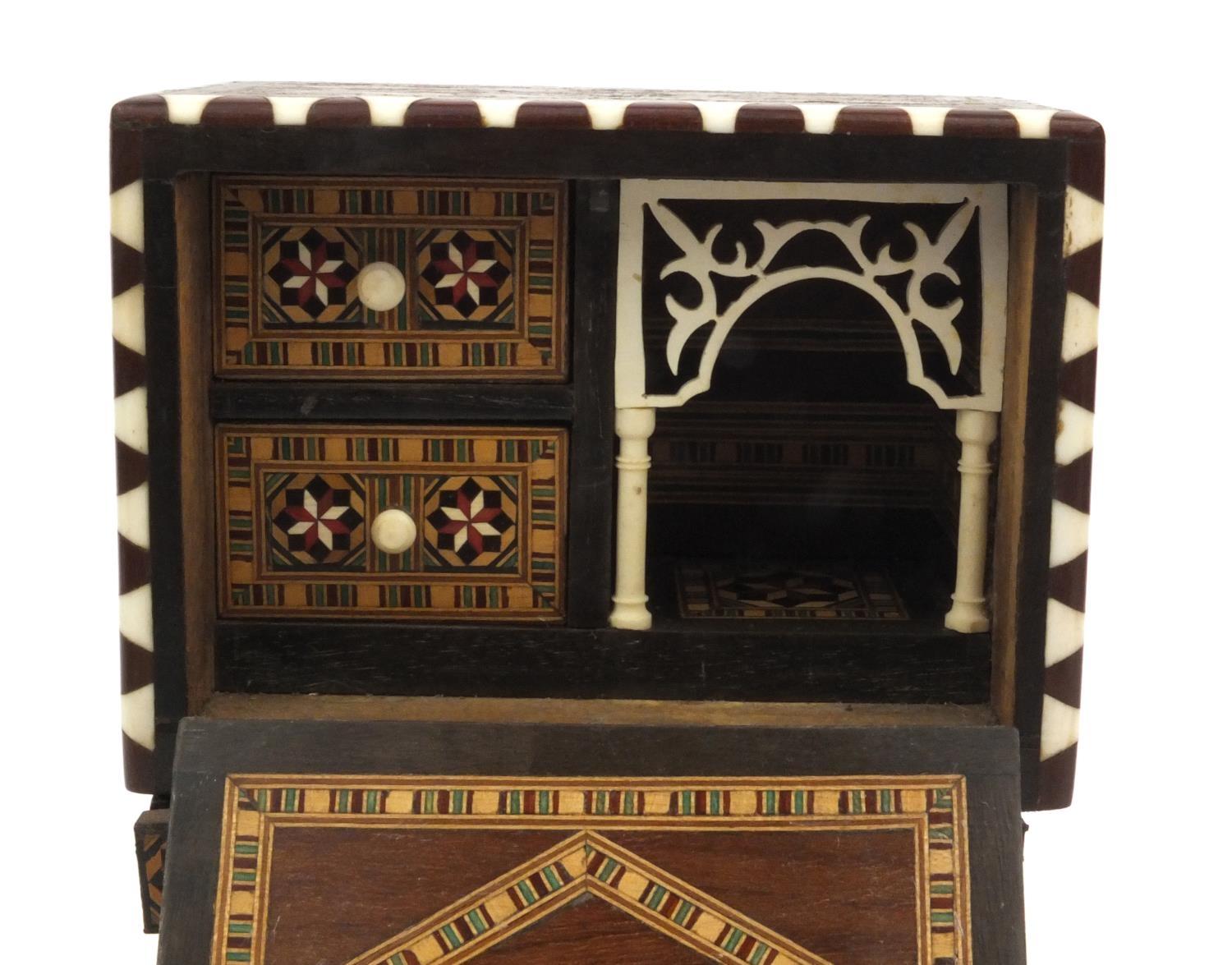 Miniature wooden inlaid cabinet with ivory supports and fitted ivory interior, 22cm high - Image 2 of 5