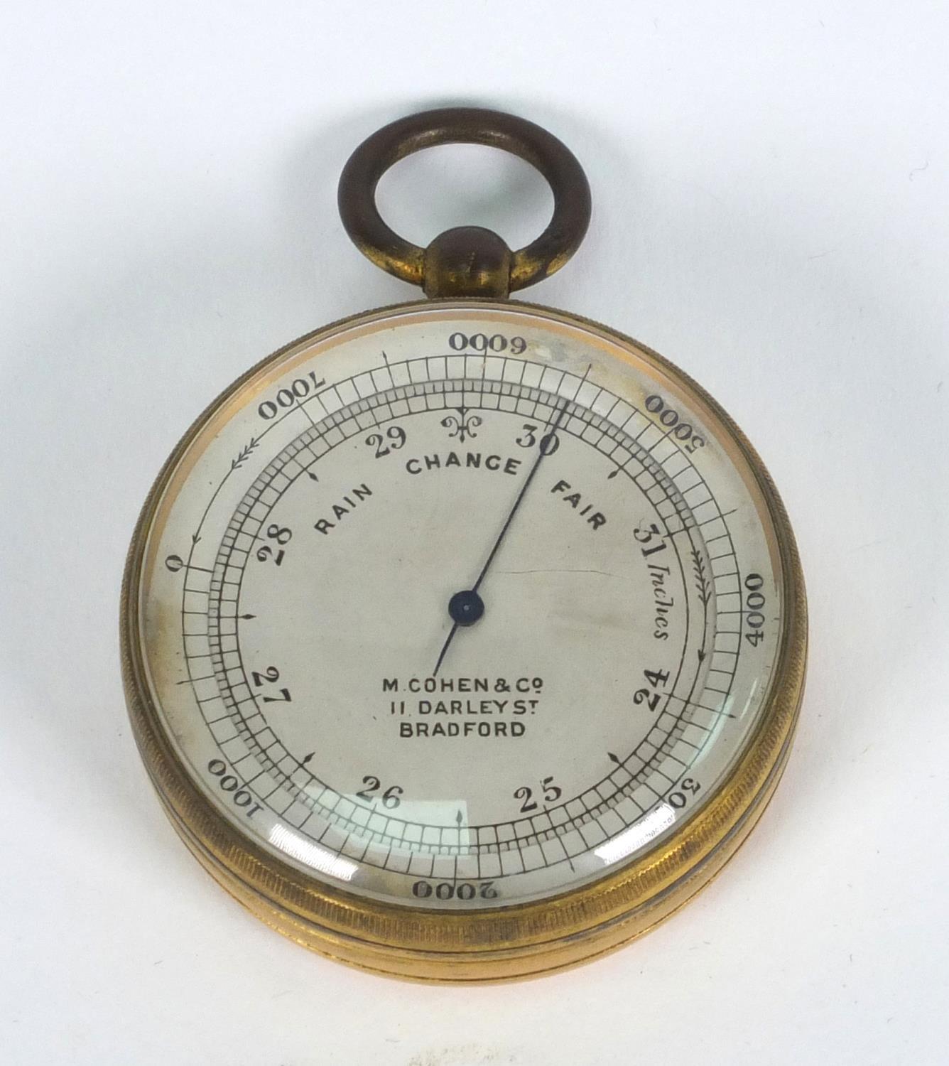 Brass pocket barometer with silvered dial, M. Cohen & Co, 11 Darley Street, Bradford, 4.5cm diameter