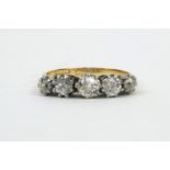 18ct gold diamond five stone ring, size O, approximate weight 3.2g The central stone is between ¼-½