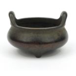 Oriental Chinese bronze censer, character marks to base, 15cm diameter