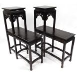 Pair of oriental Chinese hardwood two tier step stands, 96cm high x 72cm wide x 29cm deep