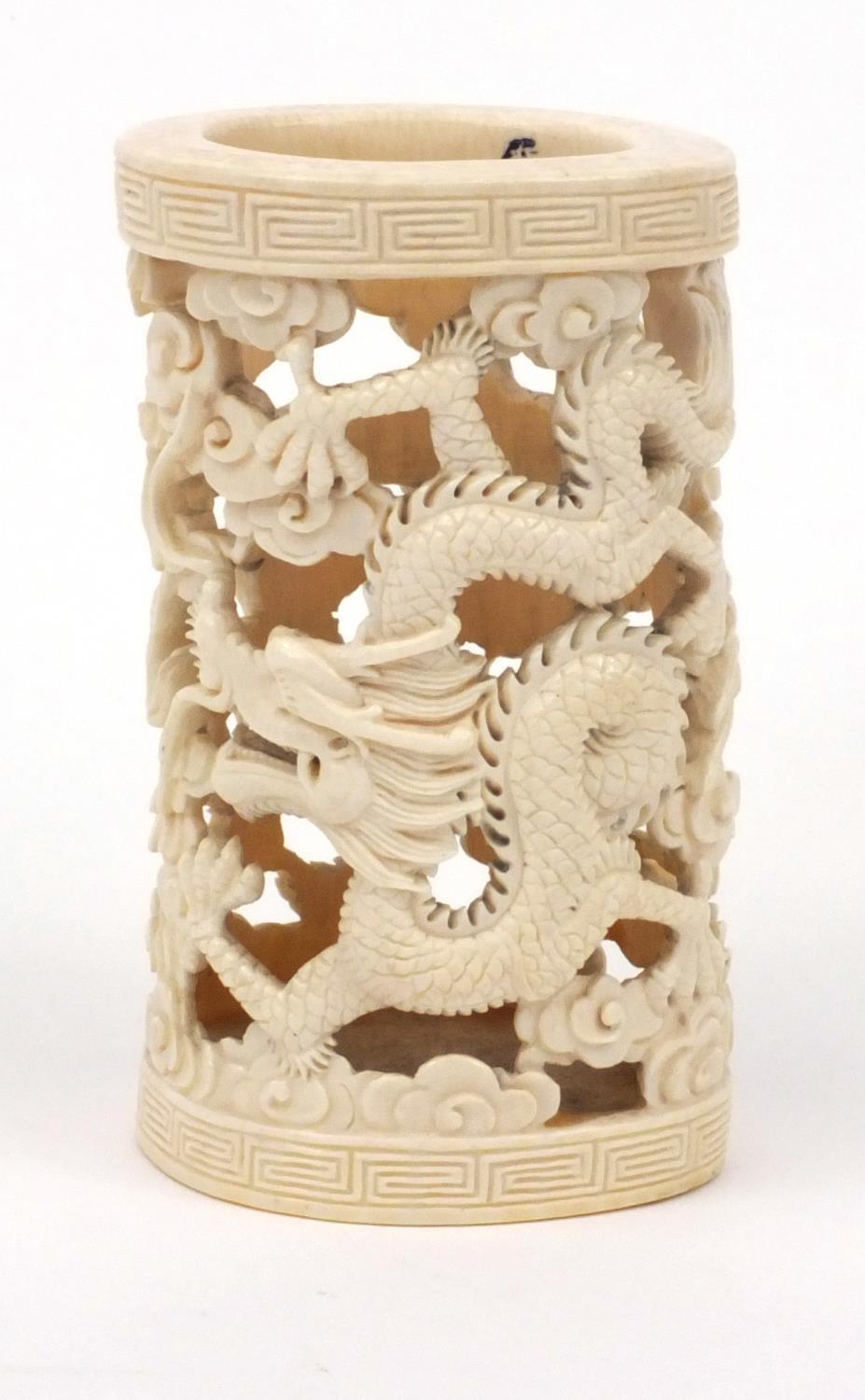 Oriental Chinese ivory pot carved and pierced with dragons, 11cm high