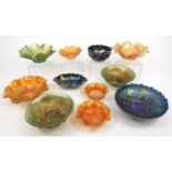 Collection of Carnival glass with floral decoration, predominantly bowls