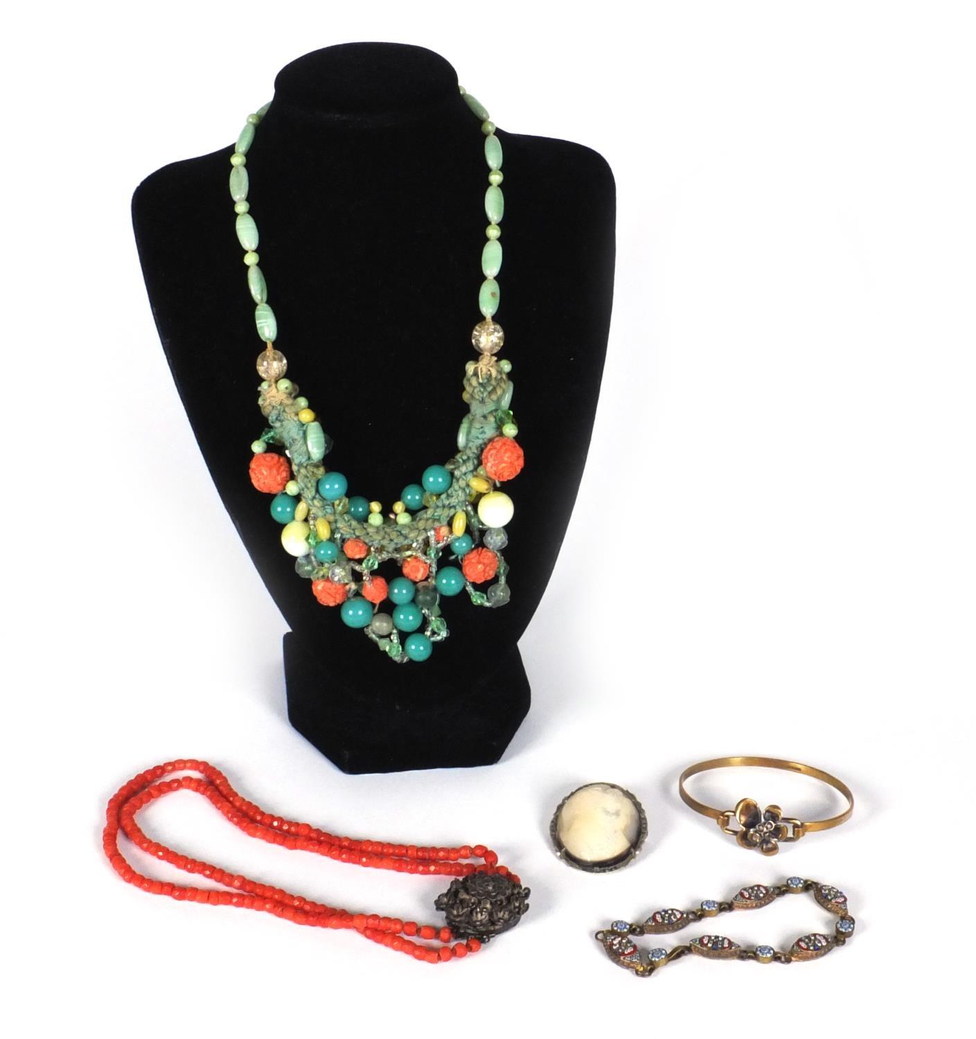 Assorted jewellery comprising micromosaic bracelet, coral necklace, polished stone necklace, gilt
