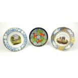 Three Newhall porcelain plates transfer printed and hand coloured with fruit and scenes, the largest