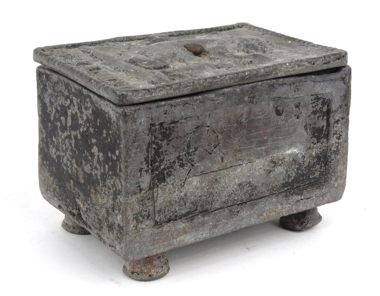 Antique lead slavery interest box, the top decorated with a man and marked 'Humanity', 13.5cm