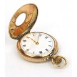 Lady's 9ct gold and enamelled pocket watch with floral chased decoration, 3cm diameter,
