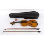 Old wooden violin and case with mother of pearl frog, together with two bows, the violin 59cm long