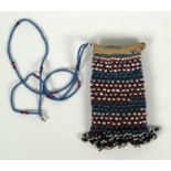 Tribal interest beaded glass purse, 13cm long