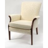 Parker Knoll armchair with cream leaf patterned upholstery