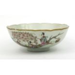 Oriental Chinese porcelain bowl hand painted with ladies, flower mark to base, 19cm diameter