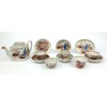 Selection of Newhall porcelain cups, saucers, tea bowls, teapot, etc, all hand painted with oriental